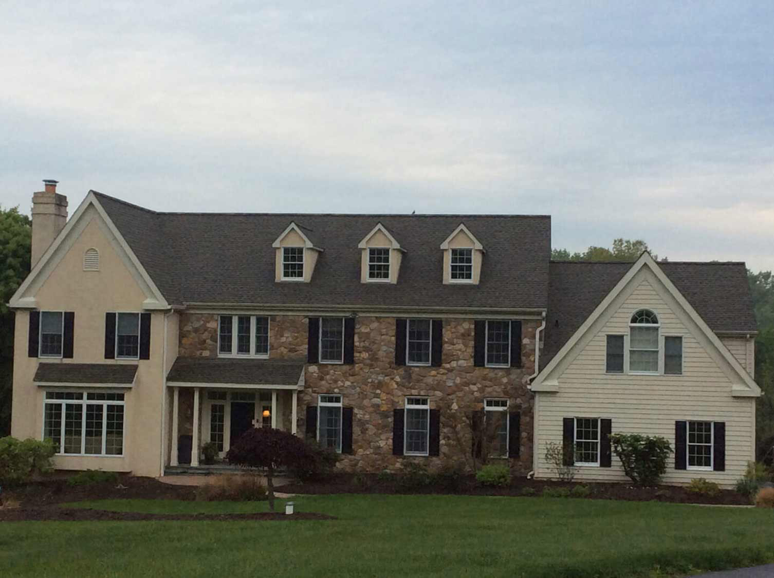 Completed residential roof by JMA Exteriors