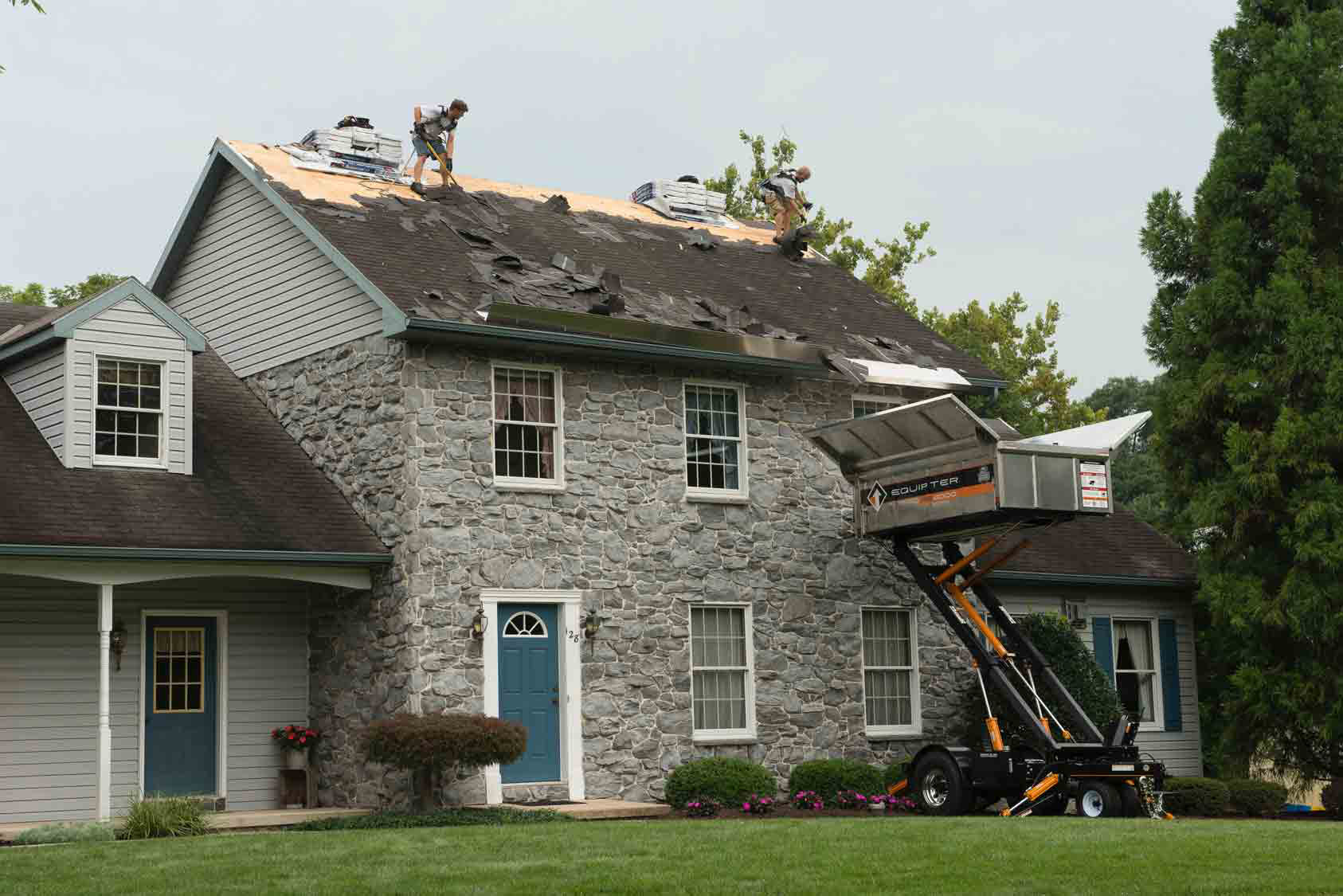Completed roof replacement showing consistent shingle lines